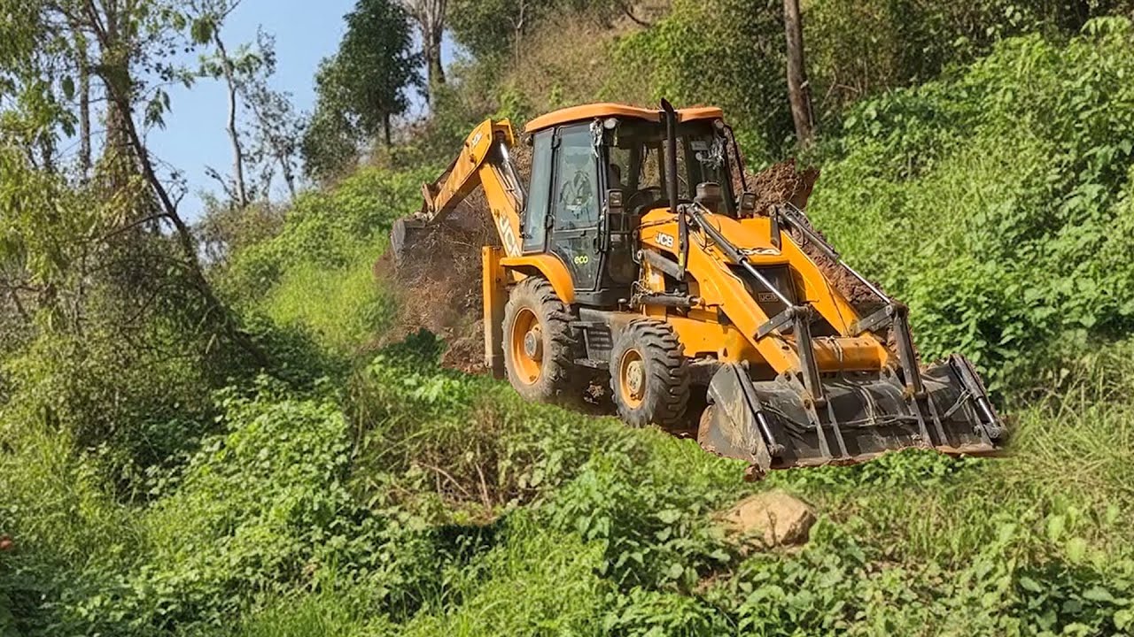 Backhoe Loader Cutting Hillside-Clearing Bushes and Small Trees-Connecting Rural Villages