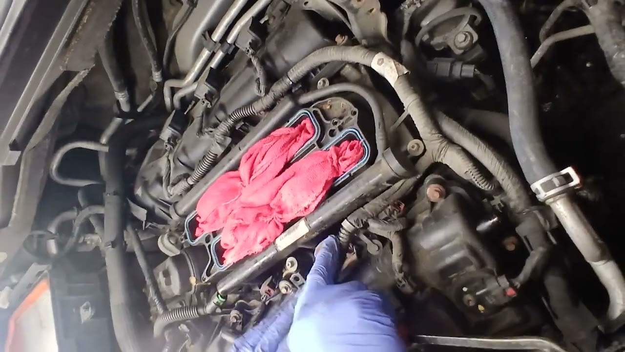 2014 chrysler town and country how to change the oil filter housing pt.2