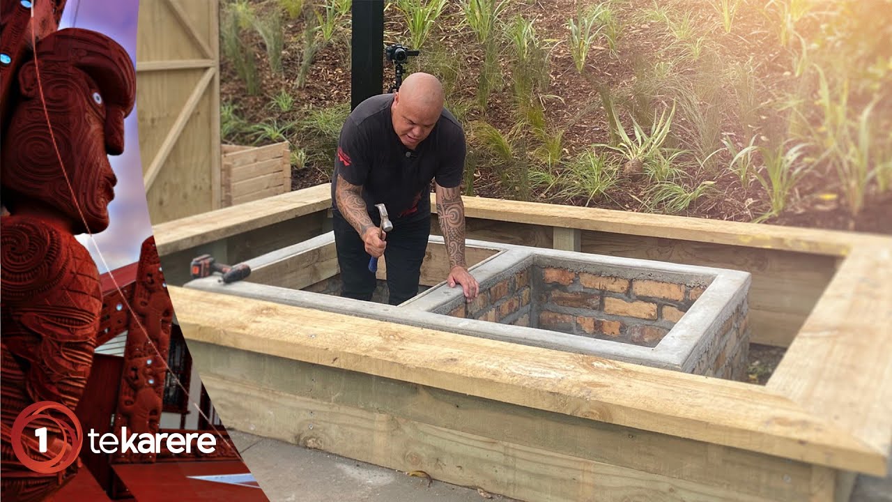 Hāngī Master places hāngī pits on Te Pane o Mataoho