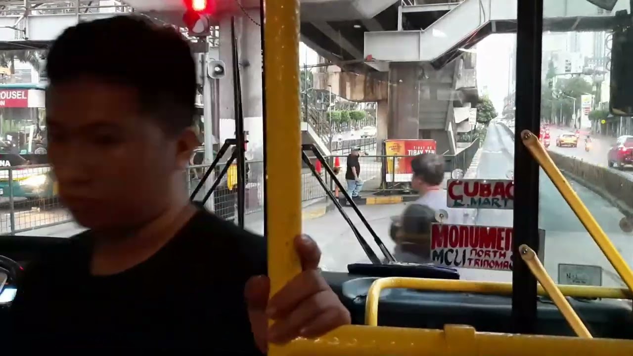 Riding a Bus Carousel from North Ave., Quezon City to Taft Avenue, Pasay City in EDSA, Metro Manila.