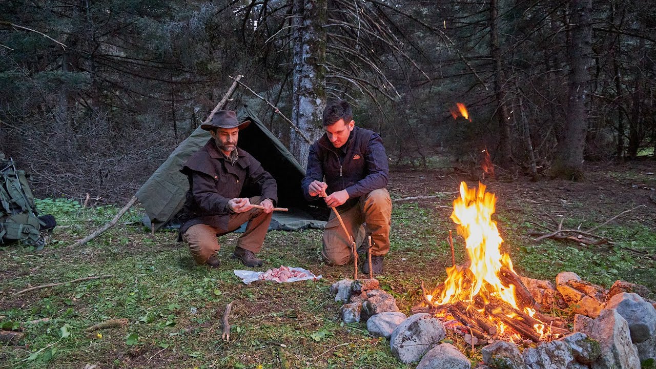 Bushcraft Wild Camping, Polish Lavvu on a tripod, making wooden skewer spit roast meat and pepper
