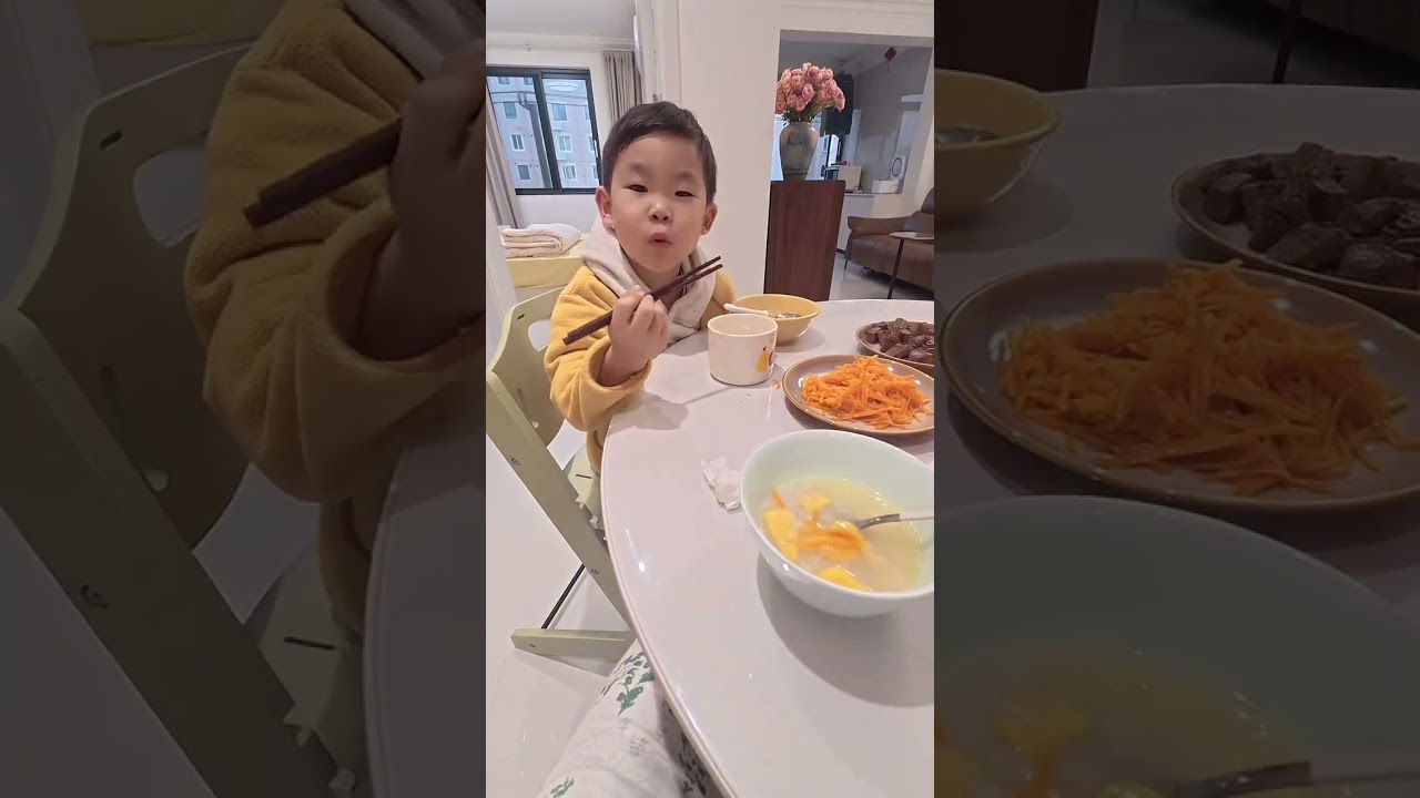 On a rainy morning I prepared sweet potato and white rice porridge black sesame rice cake