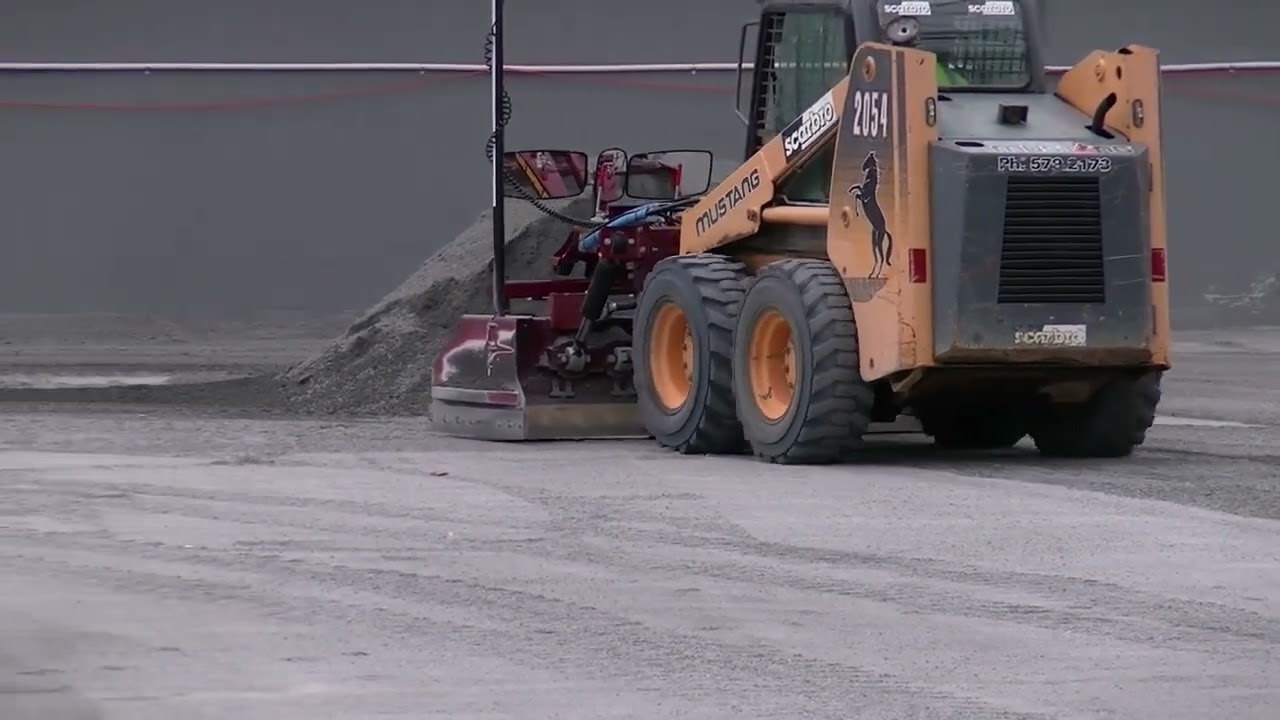 SharpGrade HD2 2 Laser Grader on Mustang 2054 skid steer.