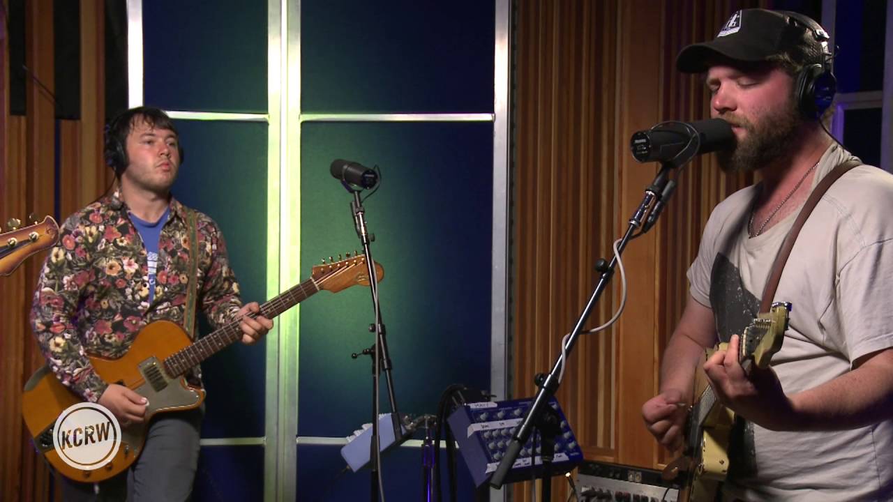 Caveman performing 
