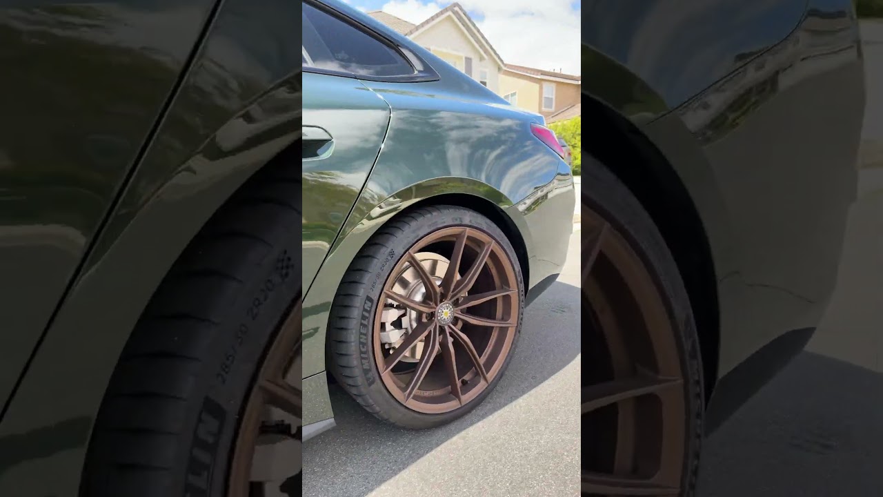 BMW i4 eDrive 40 M-Sport in San Marino Green w/ Edelweiss LT5 wheels, lowered on H&Rs