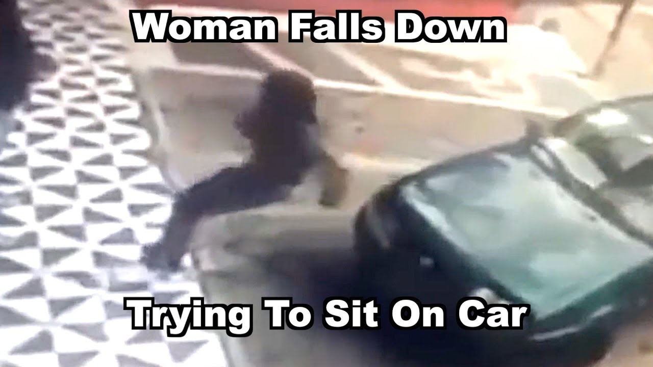 Funny Fails: Woman Falls Down Trying To Sit On Car Hood
