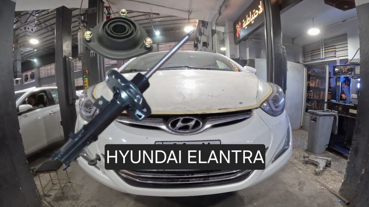 Reemplazo del amortiguador delantero - soporte del puntal ... Hyundai Elantra 2011-2015