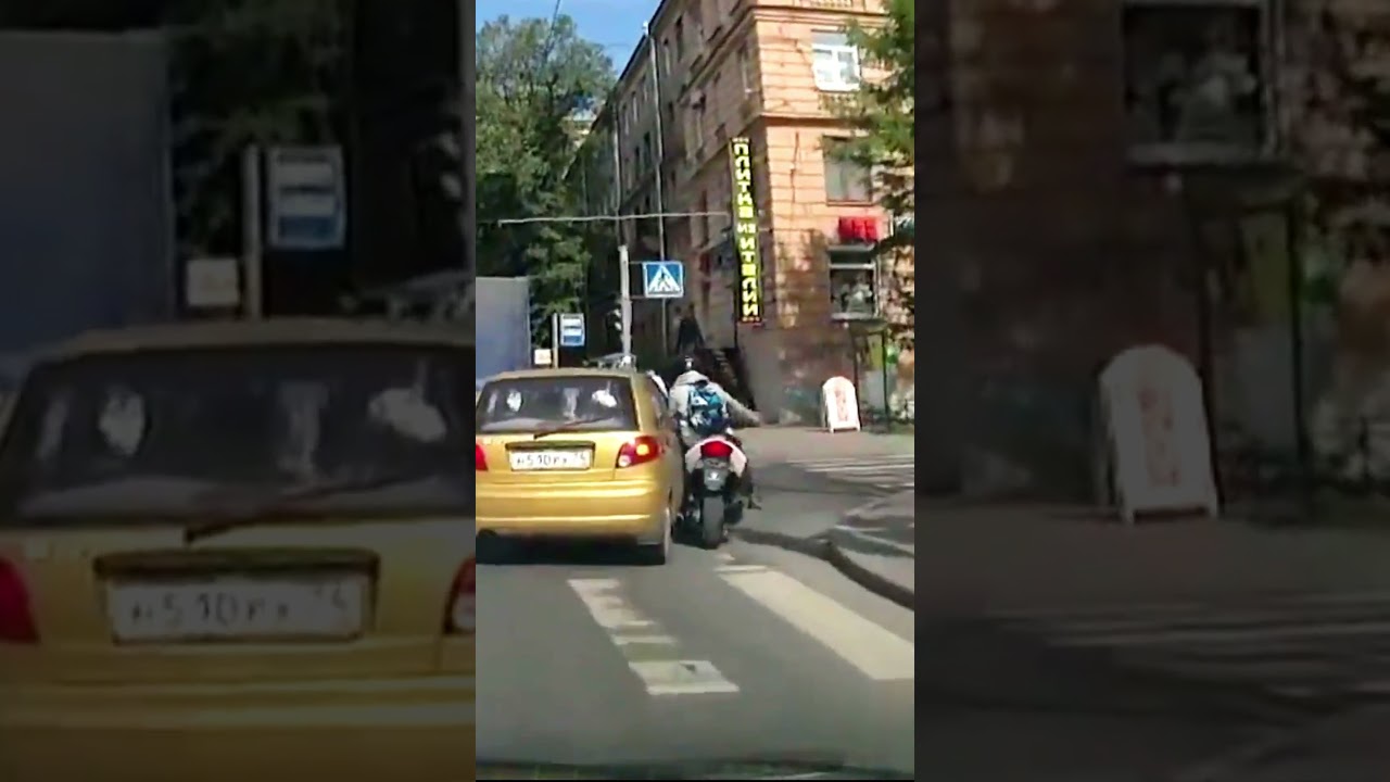 Biker Overlooks Turning Signal - Shocking Road Safety Incident