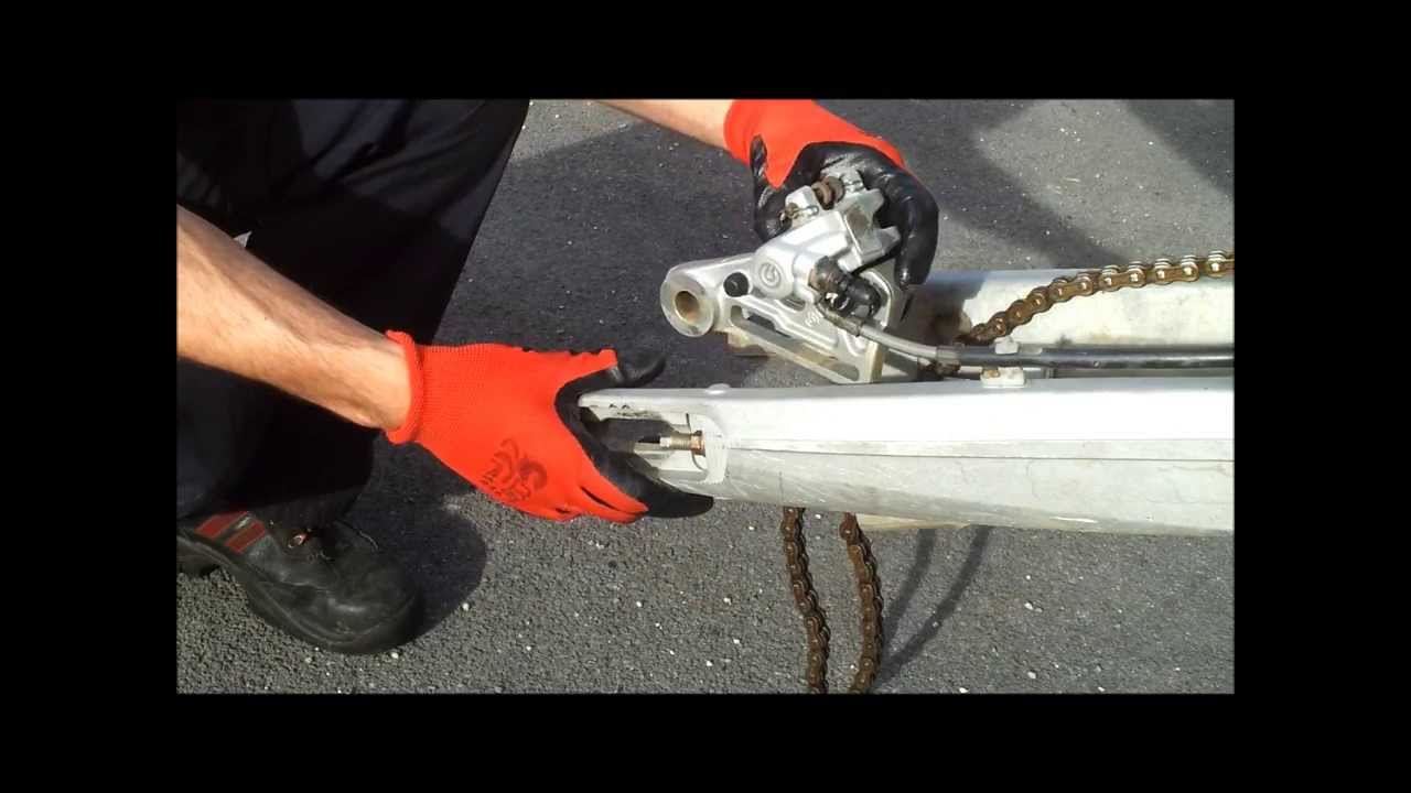 How to remove KTM swingarm