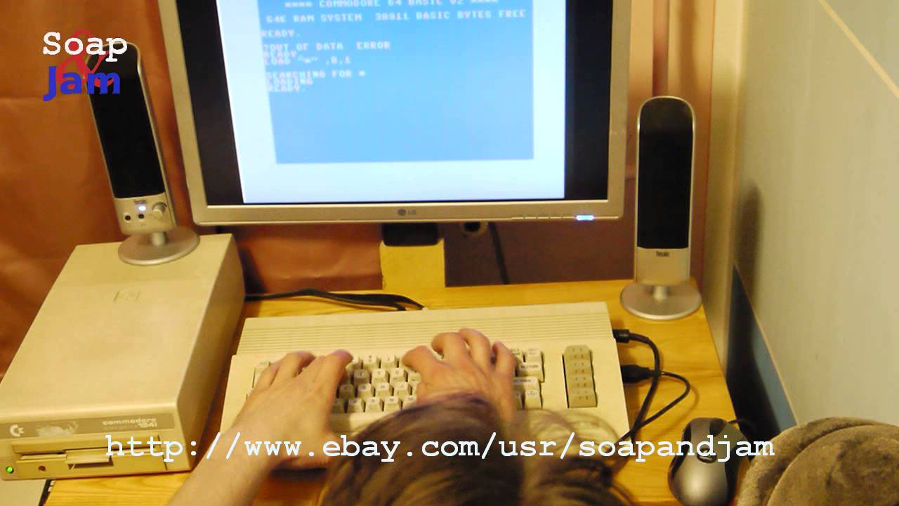 Vintage Computer Commodore C64. Disk Drive 1541 & Ikari Warriors.