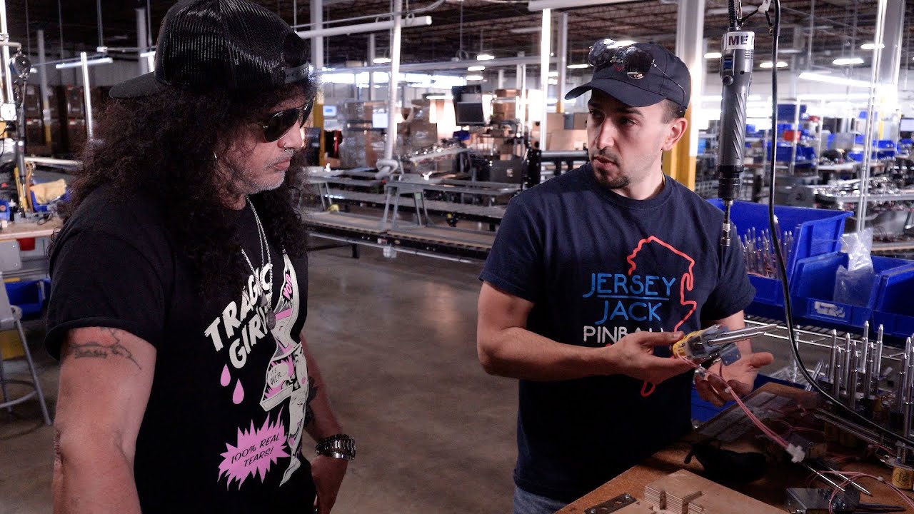 Guns N' Roses lead guitarist and pinball co-designer, Slash tours Jersey Jack Pinball.