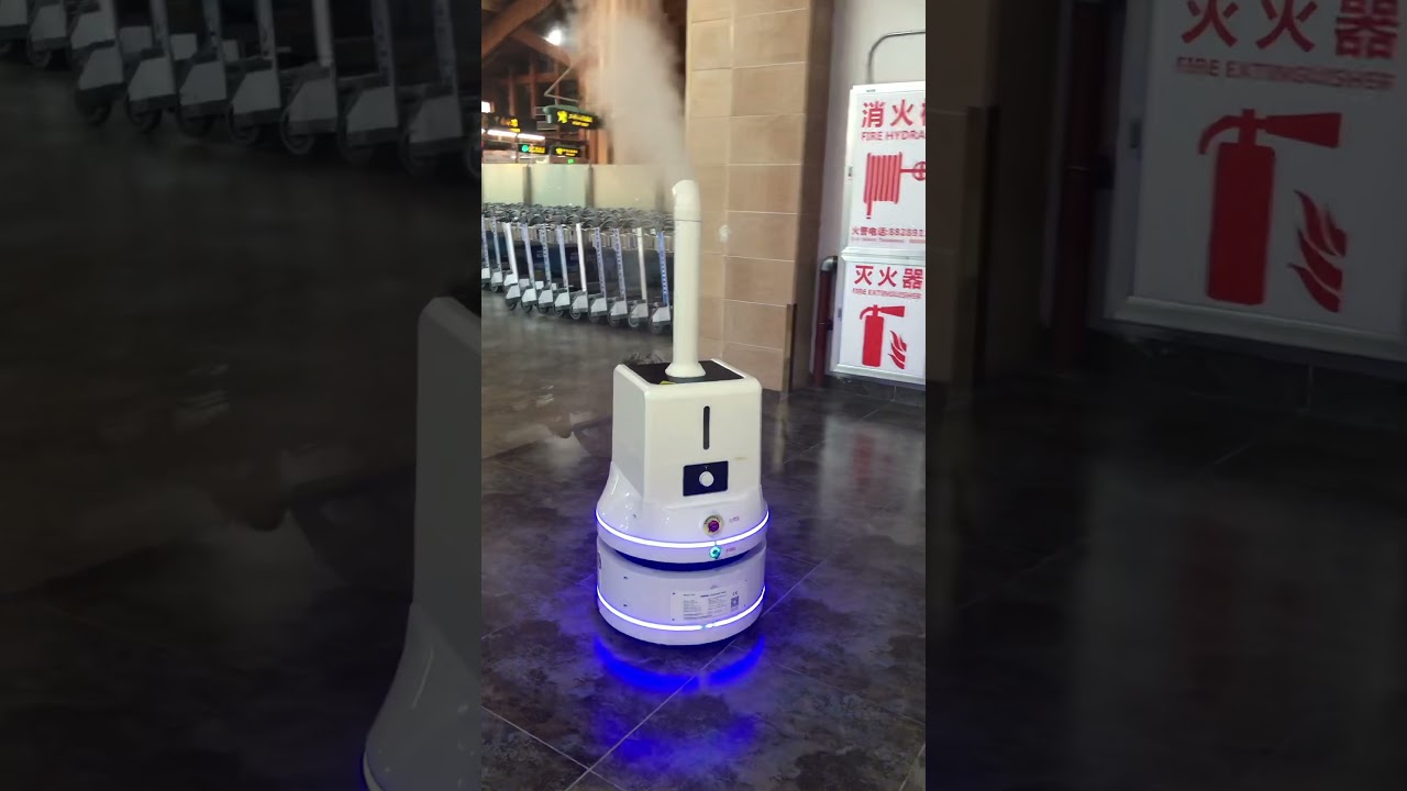 Hightech disinfectant spray smart robot at the airport