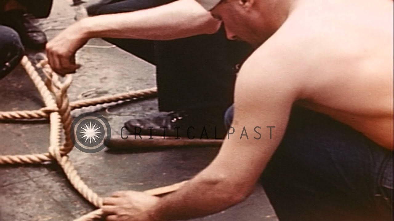 Men make cargo nets from 2