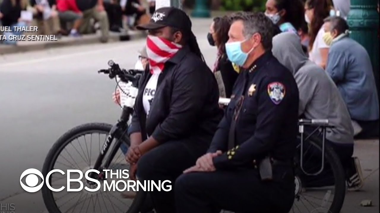 Some police join marches, take a knee with protesters