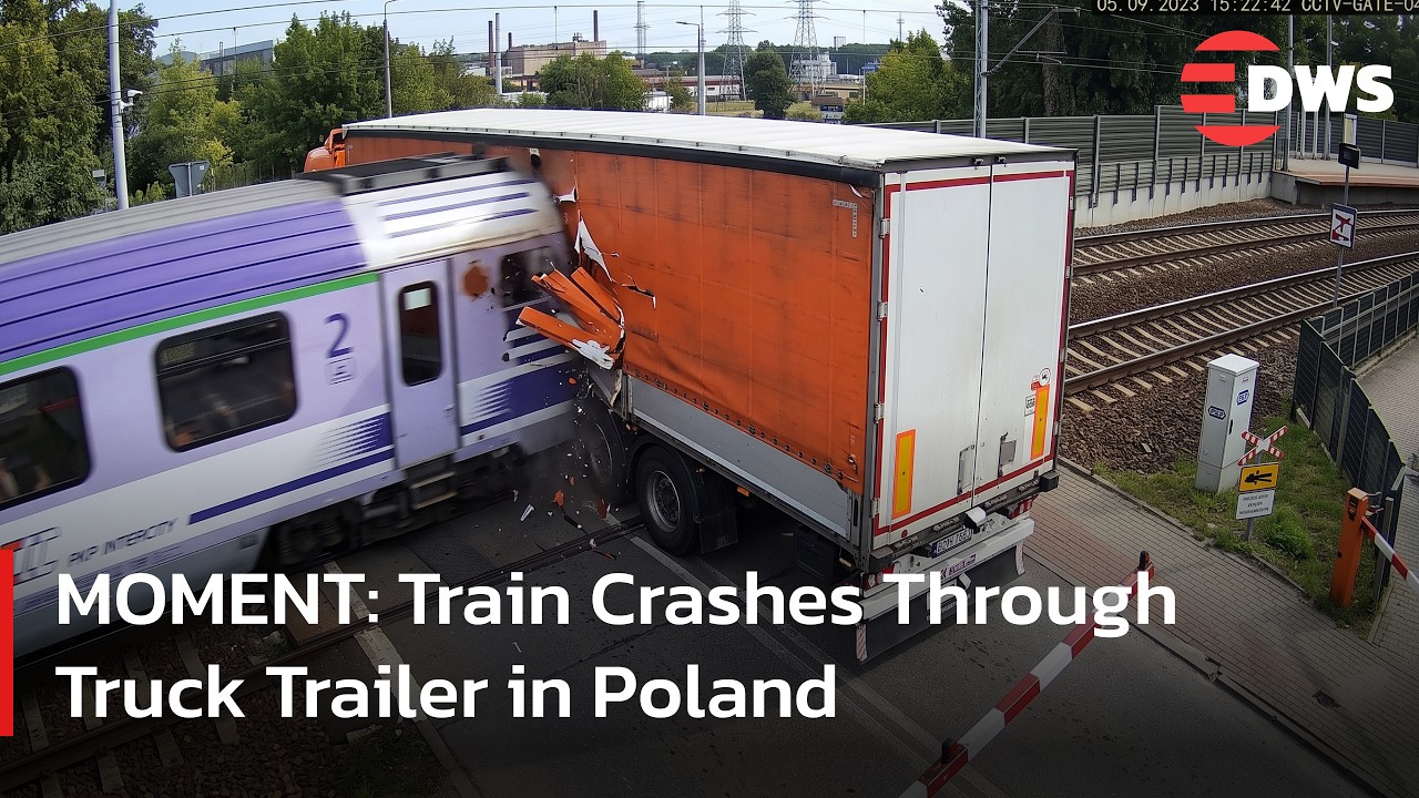 RAW VISUALS: Train Smashes Stuck Truck Trailer at Level Crossing in Poland | DWS News | AP1F