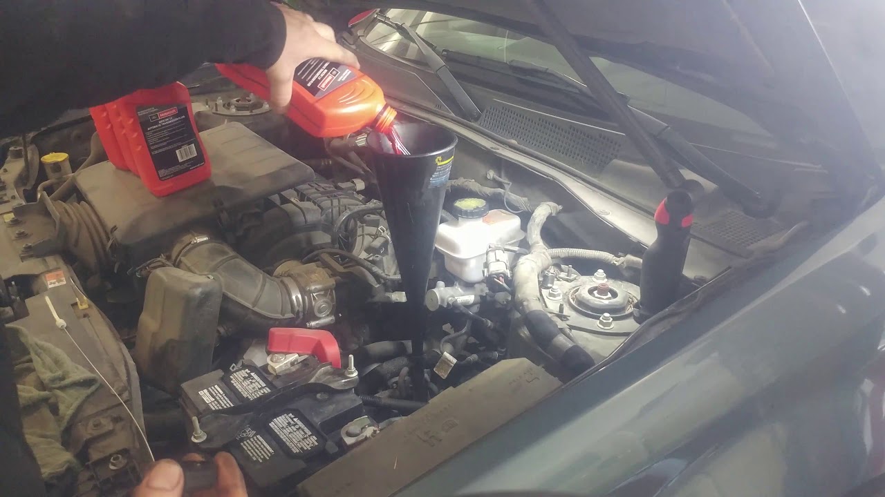 Transmission drain and fill 2012 Ford Escape. Automatic transmission fluid replacement.