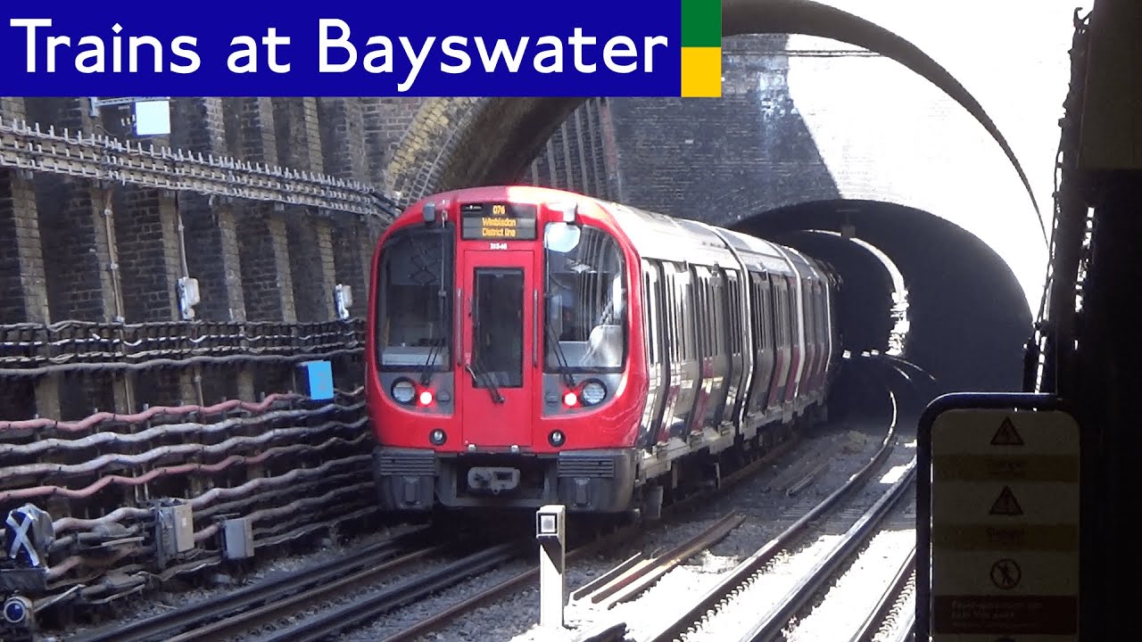 London Underground: District and Circle line trains at Bayswater