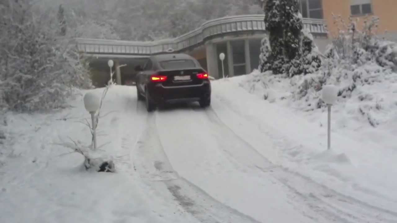 BMW X6 xDrive40d vs snow and ice 20% slope