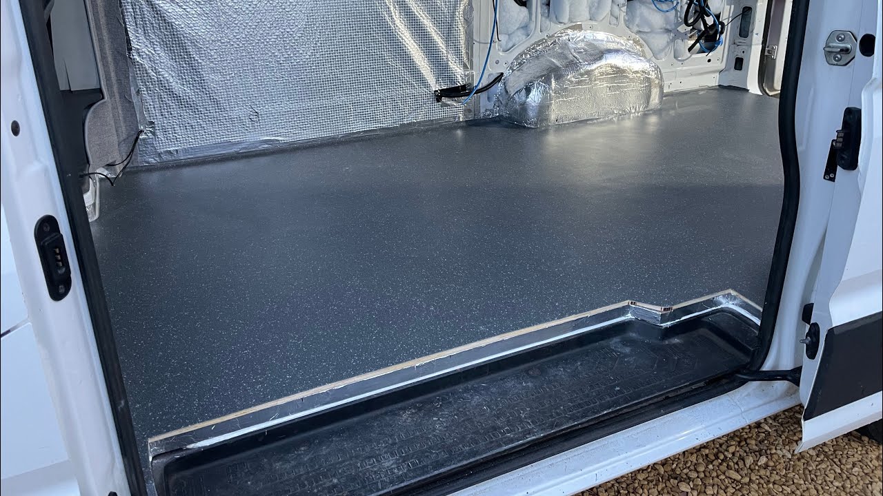 VW Crafter Campervan conversion Fitting Altro flooring.