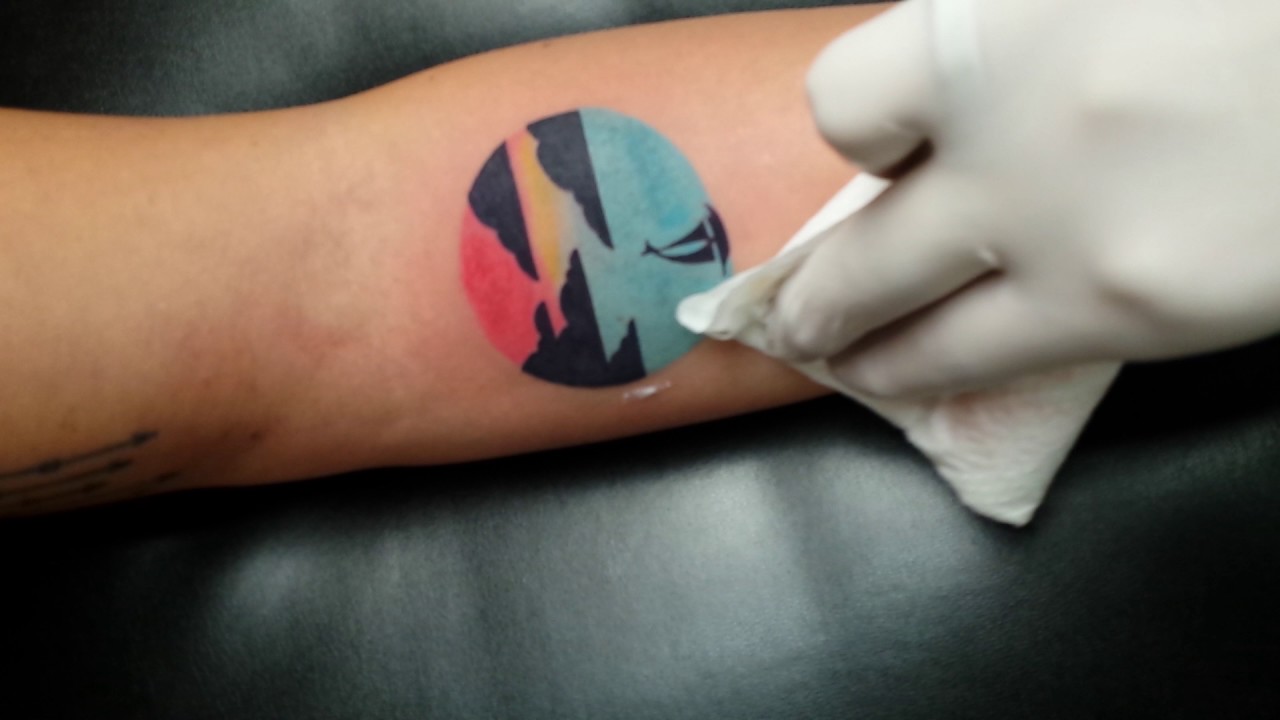 Colorful sunset tattoo by Be Beauty