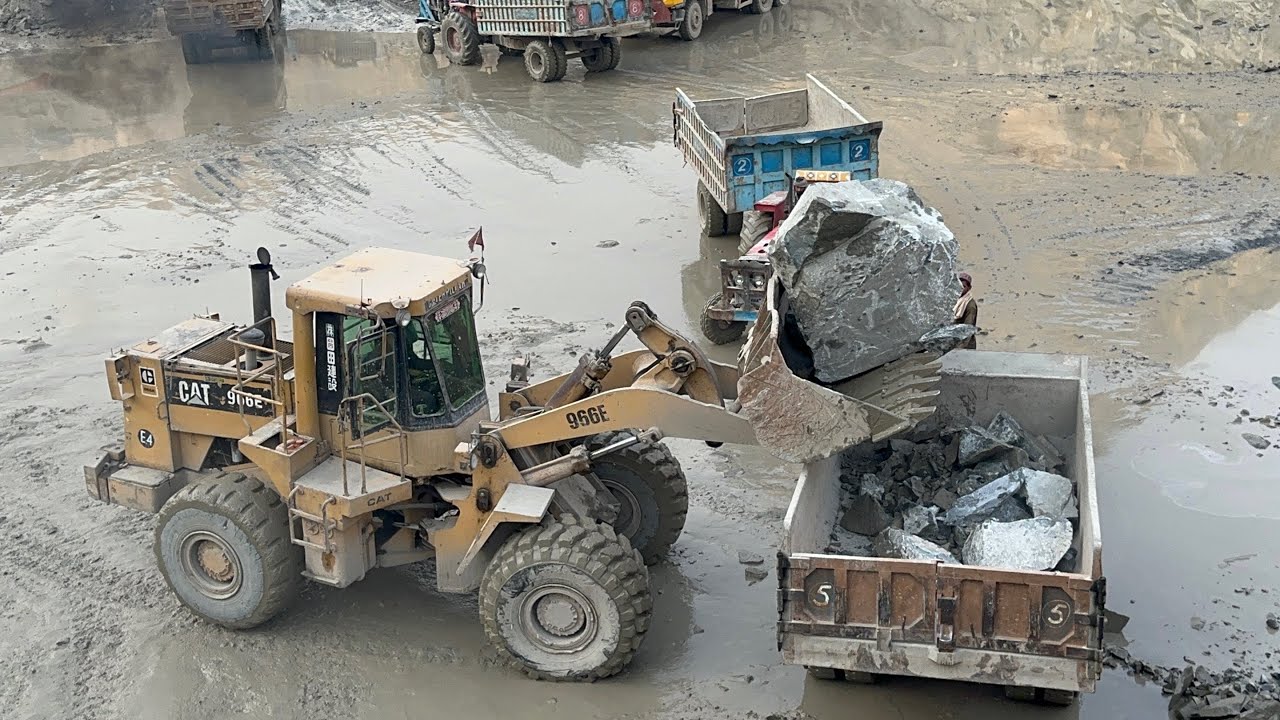 Mega Rock Loading by Caterpillar 966DHOWO Dum Truck Getting Loaded by CAT 966DHeavy Machinery Workin