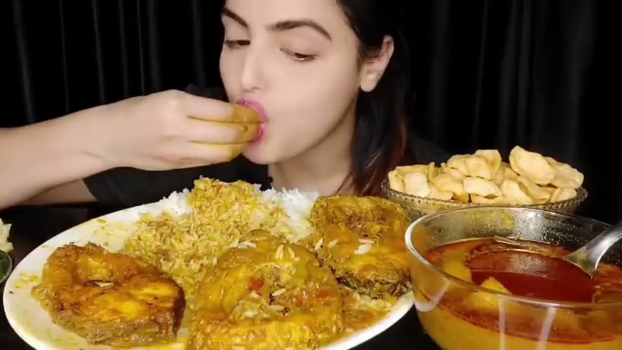 Eating fish curry spicy food eating curry spicy chicken curry 