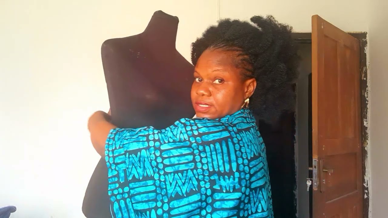 Taking a waistcoat measurement.