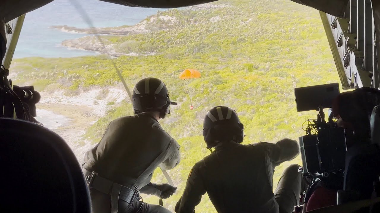 U.S. Coast Guard Air Station Miami airdrops supplies on Anguilla Cay, Bahamas