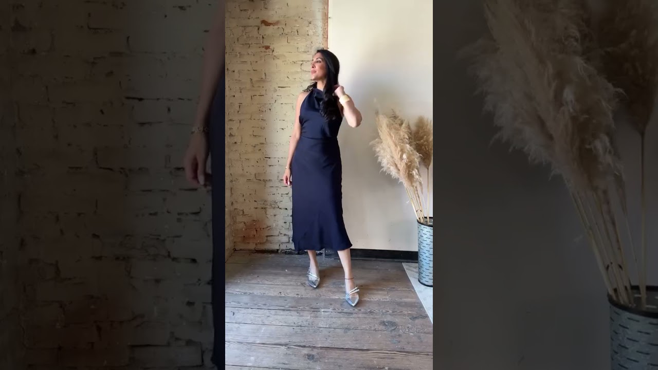 Discover the effortlessly chic, washable stretch silk high-neck midi dress, exclusively at