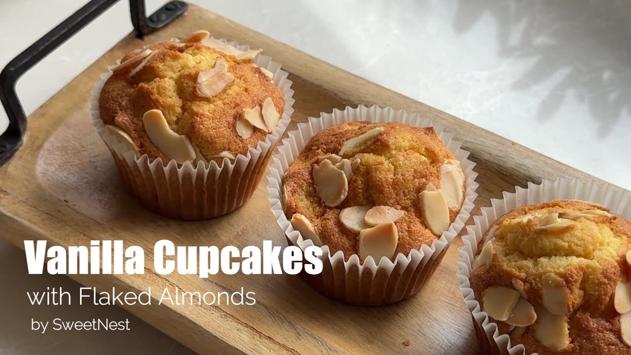 Vanilla Cupcakes with Flaked Almonds - soft, moist and delicious vanilla cupcakes perfect with tea!