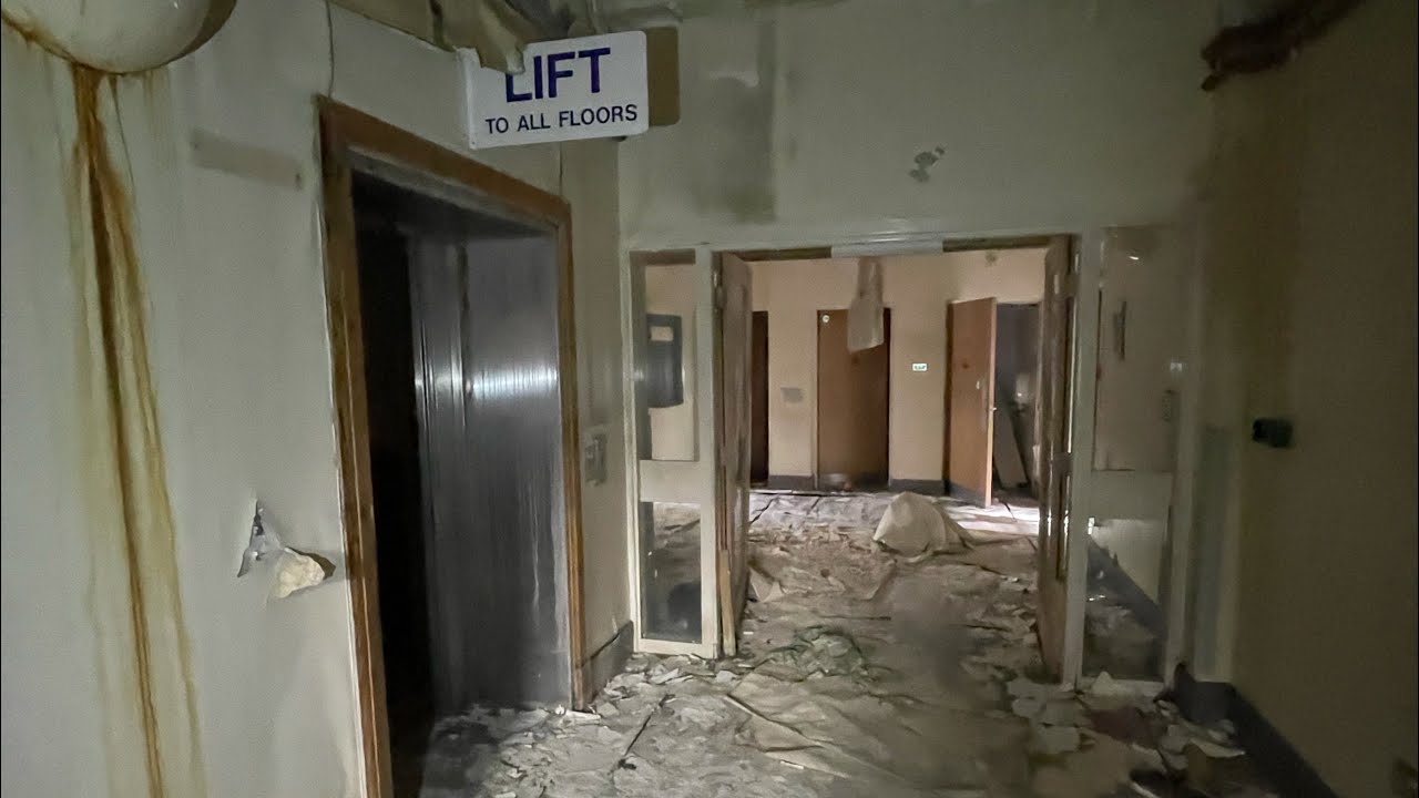 Exploring a abandoned asylum...(prison security turn up over flying drone)...raw footage