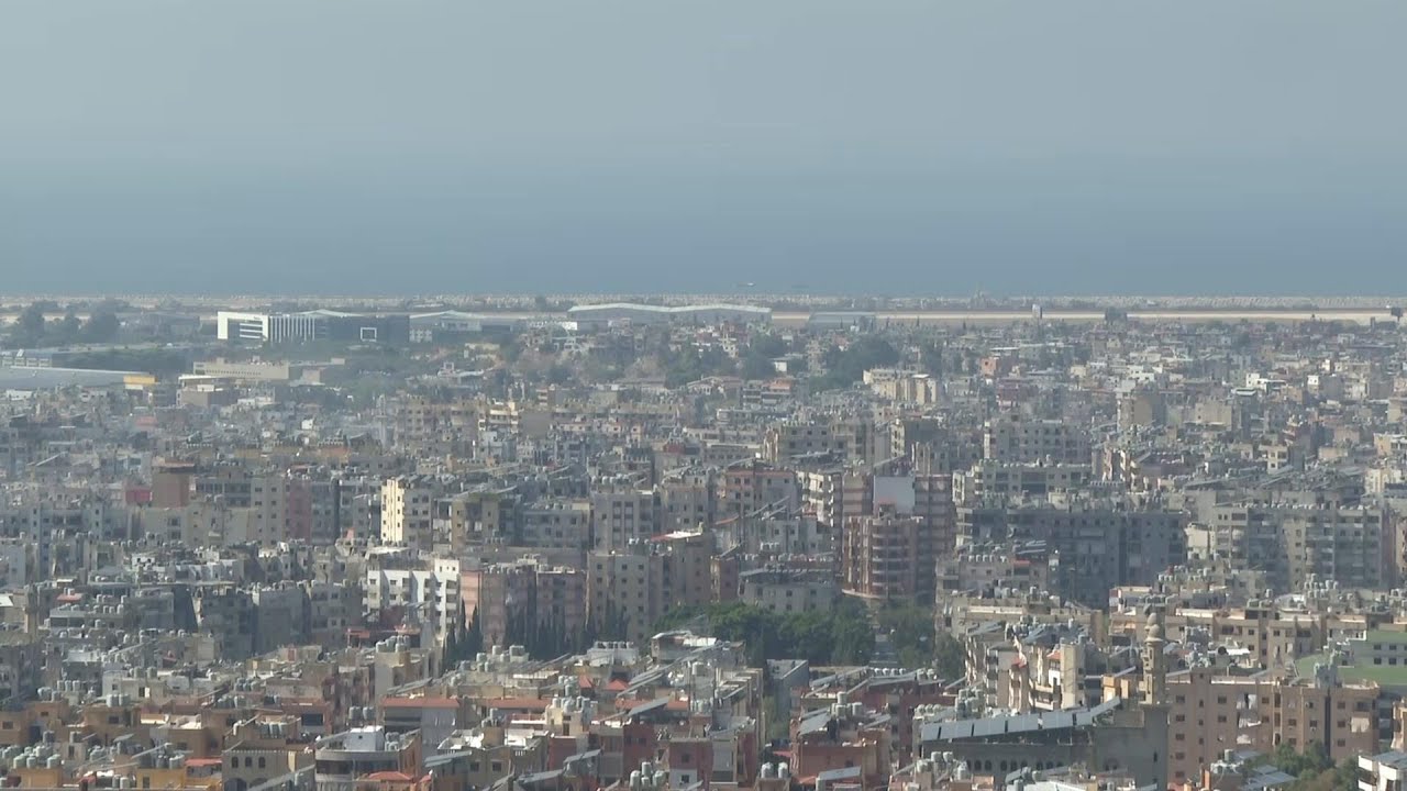 Thick palls of smoke rise after blasts in southern Beirut