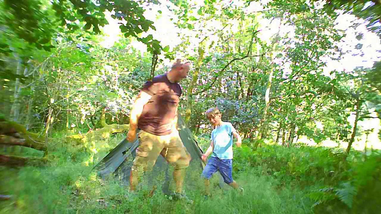 Wild Camp - CharWood in a camouflage Lavvu tent