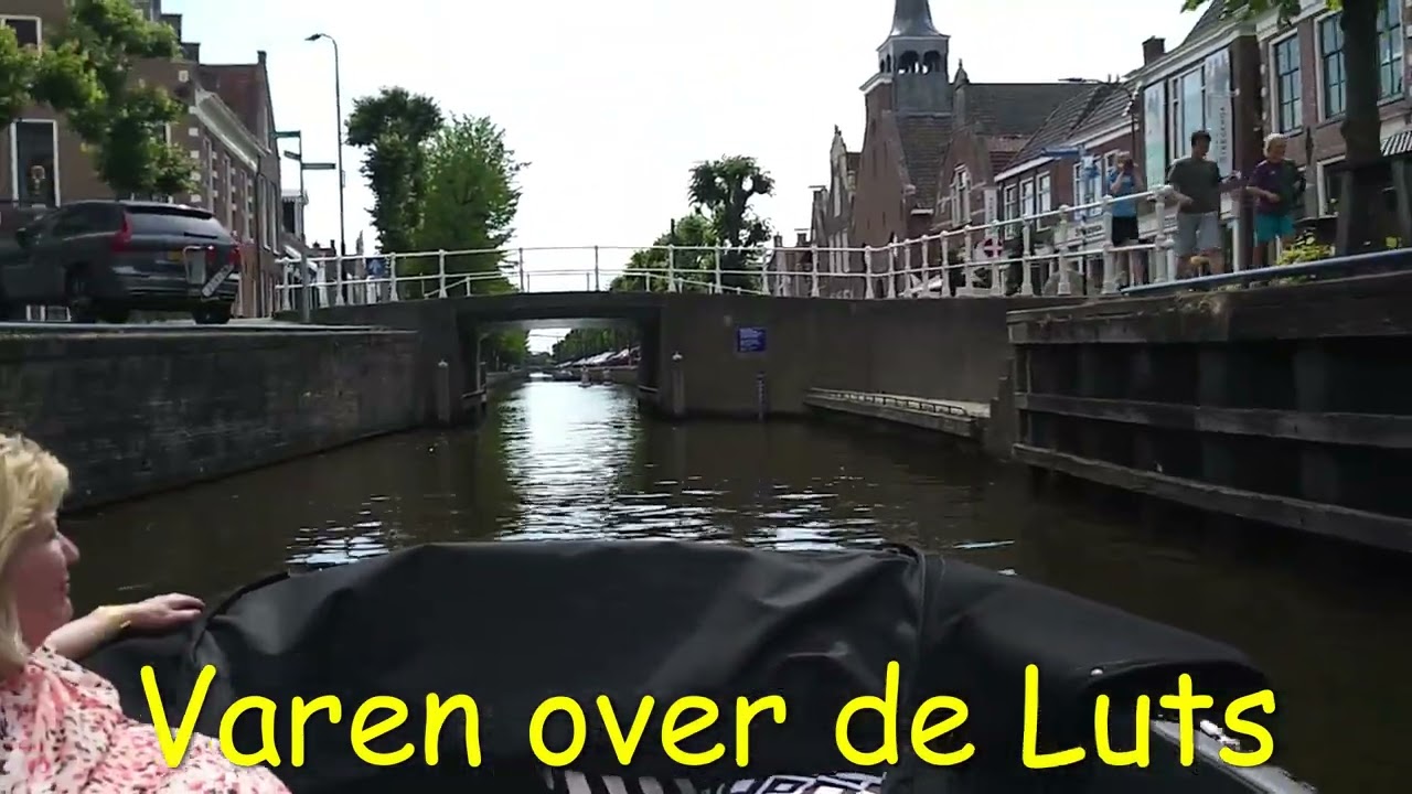 Met de sloep varen van camping de Kuilart naar Woudsend en Balk .