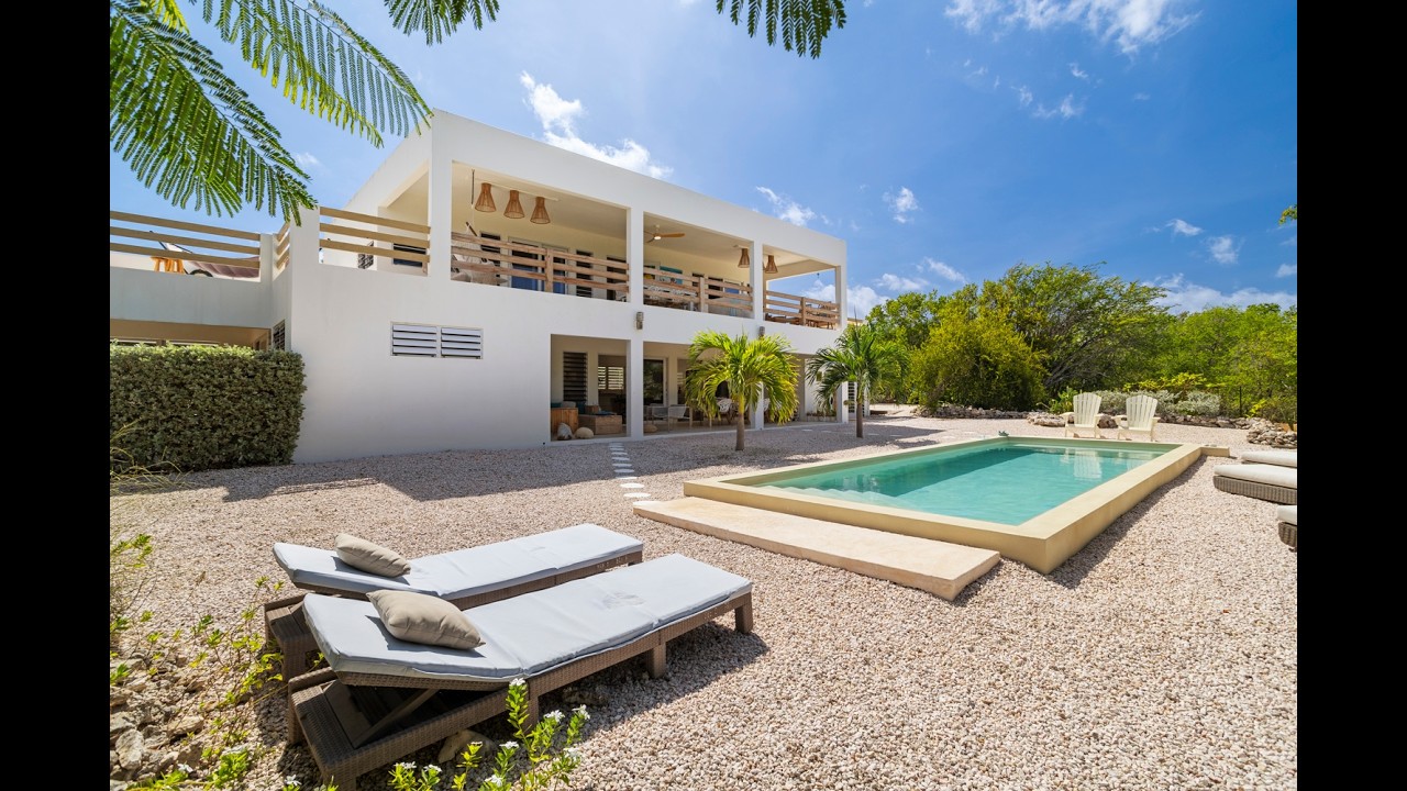 For Sale: Crown Terrace 76 - Modern villa on freehold land with wide views on the Caribbean Sea