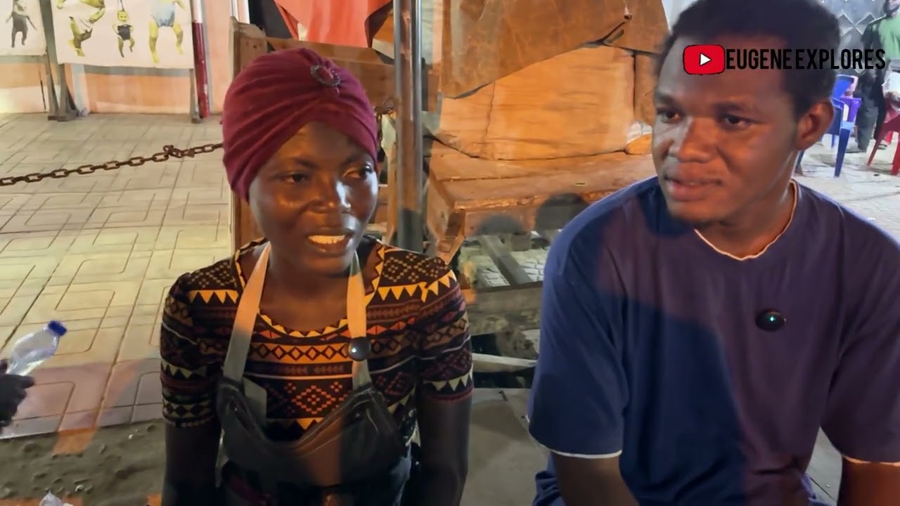 Walking through Ashaiman Market after dark