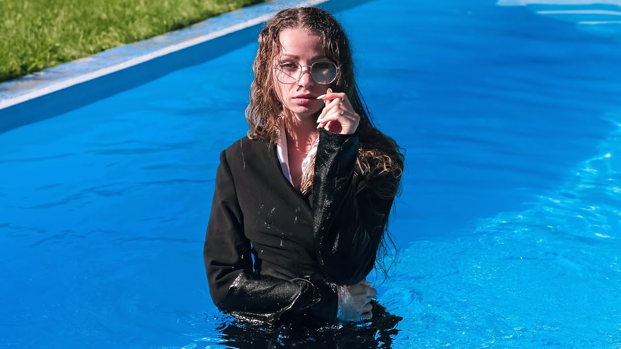 UNEXPECTED! SHE BEATS THE HEAT IN A BUSINESS OUTFIT SPLASH [WETLOOKER ID: b50-mari4]