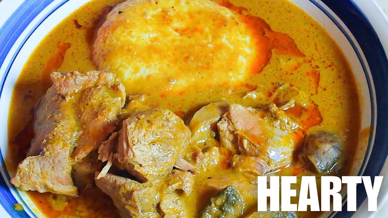 Palm Nut Soup with Tender Lamb & Rice Balls | Flavorful Homemade Dish