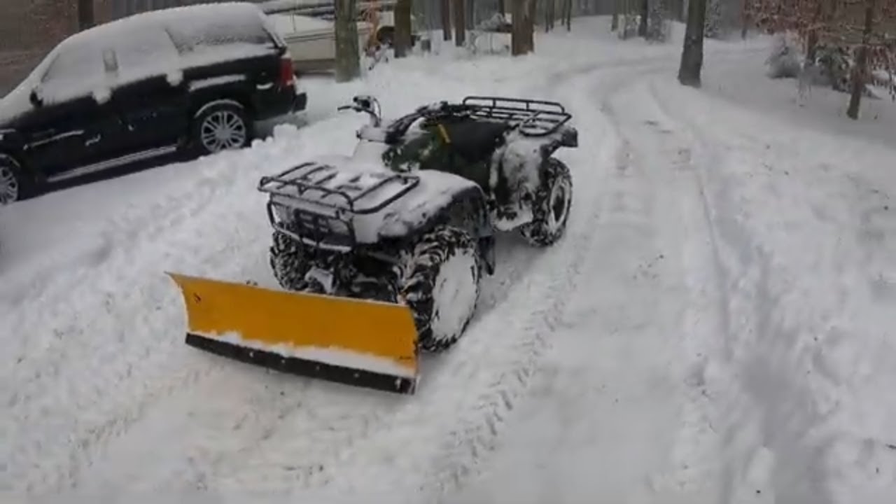 Plowing snow on a Honda fourtrax 300 atv