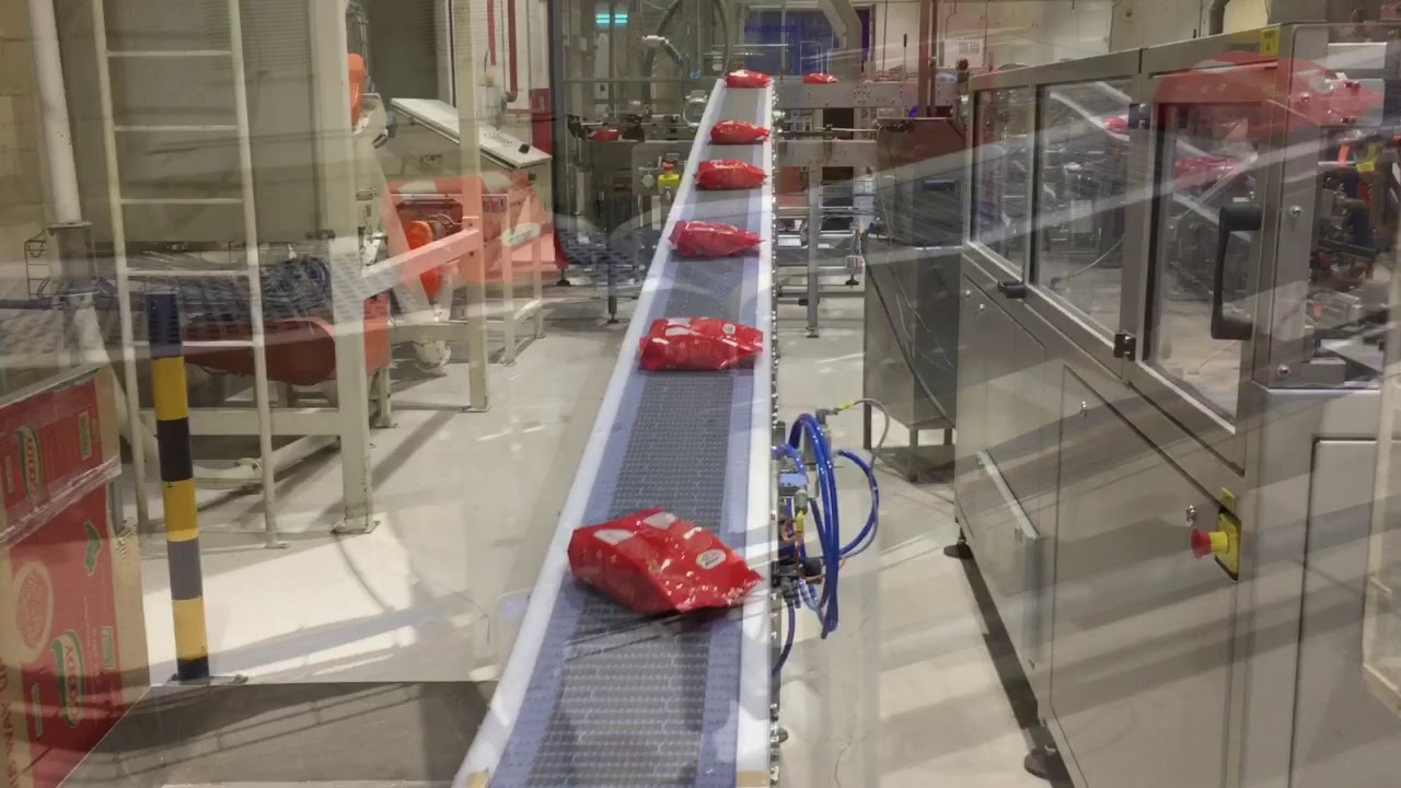 Sistema Transportador de embalaje secundario para el sector alimentación | Traktech SL