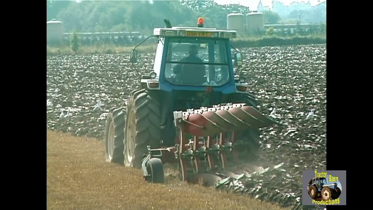 FORD TW-15 FORCE II AND FIVE FURROW PLOUGH
