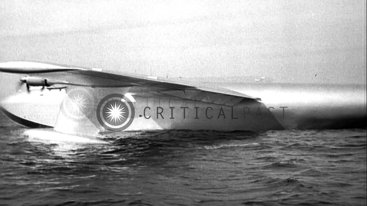 Hughes H-4 Hercules flying boat reaches point of liftoff on its maiden flight in ...HD Stock Footage