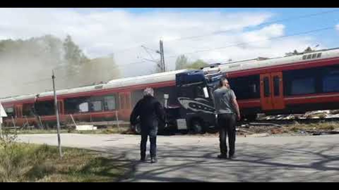 Train Trashes Boat Off Transporting Truck || ViralHog