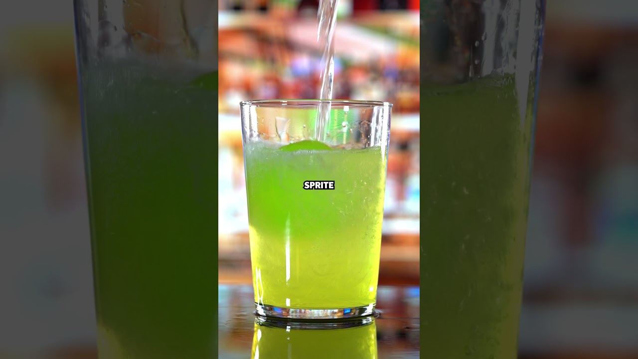 Sour Apple tequila cocktail tutorial: how to make an epic ice ball drink. #drinking #over21