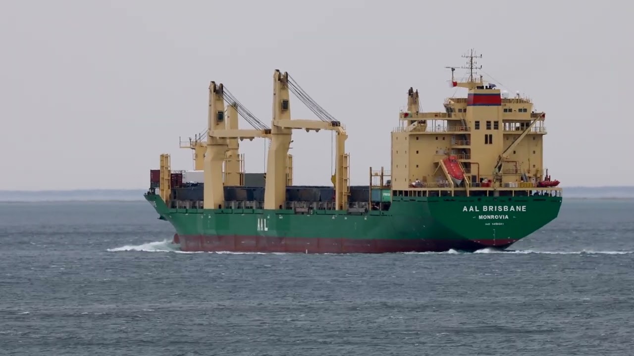 The heavy lift ship AAL Brisbane and box boat Seaspan  Hamburg pass Point Lonsdale, Vic, Australia.