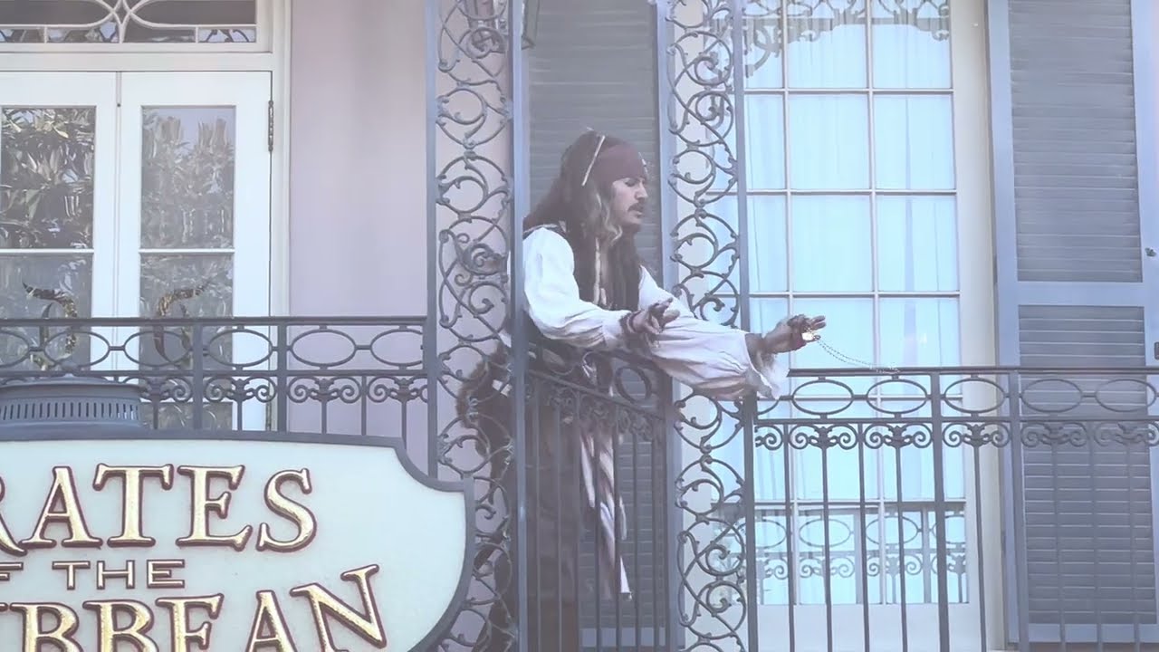 Johnny Depp I mean Captain Jack Sparrow was throwing necklaces to guests! // Disneyland