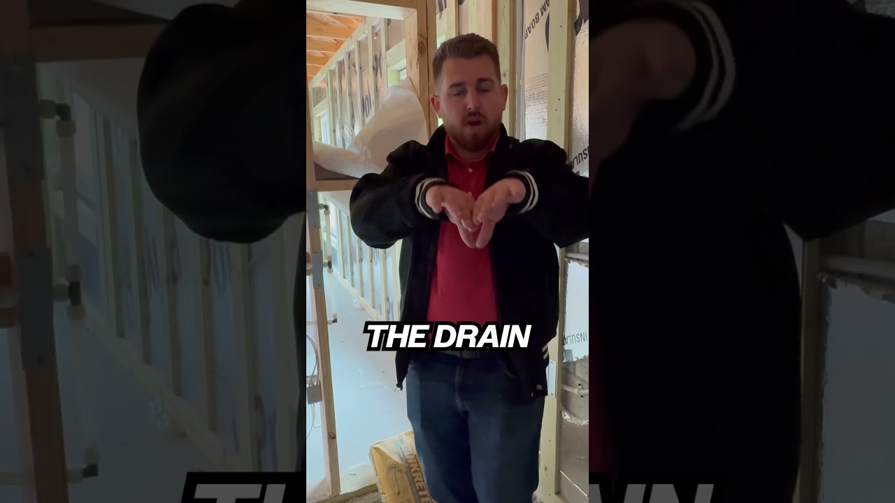 The best way to create a zero-entry shower is by sinking the shower down into the floor.
