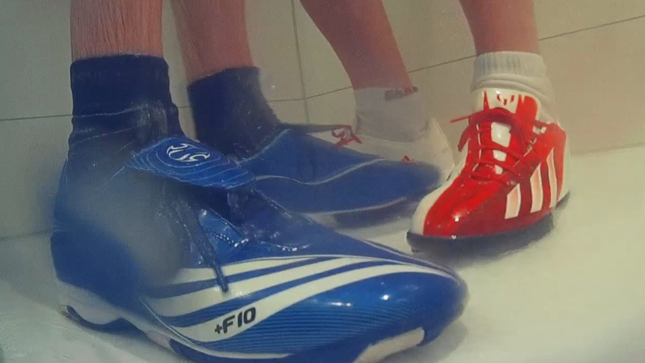 two guys with Soccersneaks under the shower