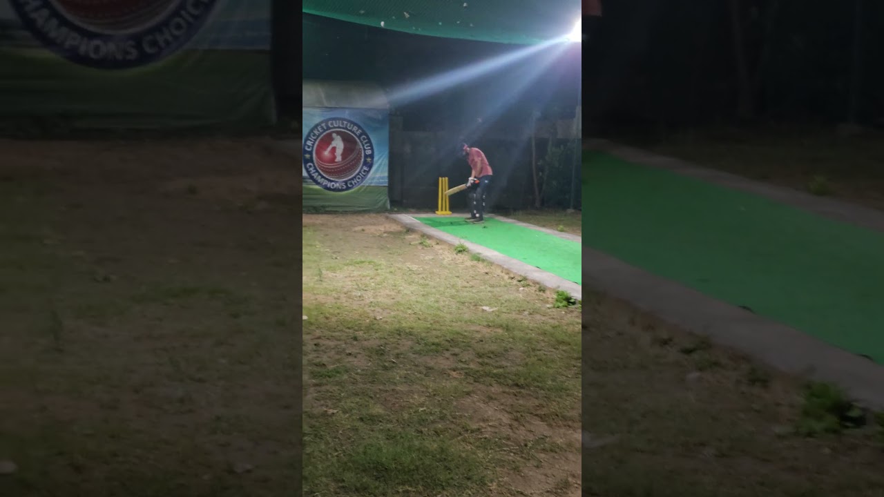 Net session with bowling machine and Gray Nicolls bat.