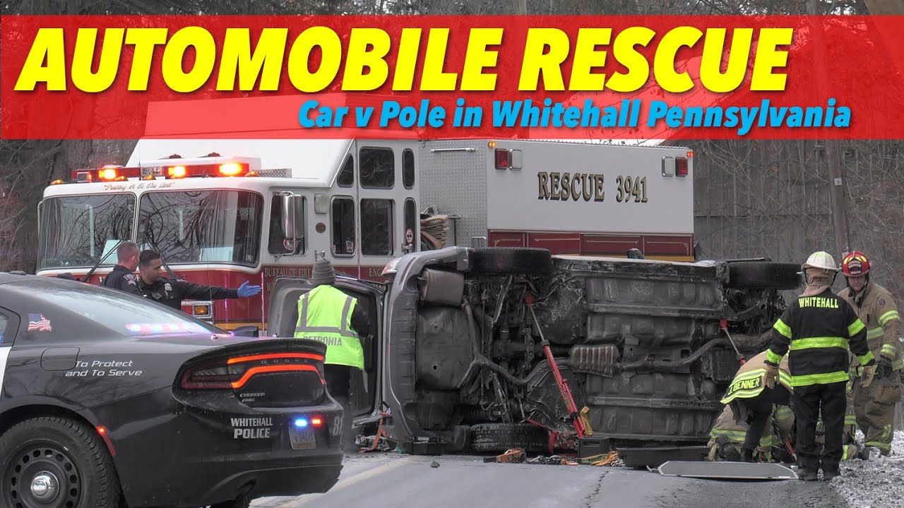 Car hits pole, lands on its side with female trapped, Whitehall Pennsylvania